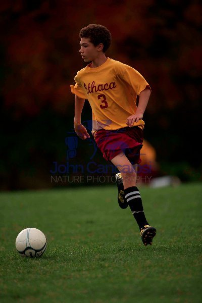 Boy playing soccer (football) - New York - USA- Model released