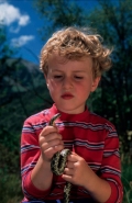 Boy Looking at Snake - Spain
