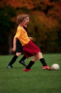 Boy playing soccer (football) - New York - USA- Model released(b