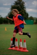 Boy Practicing Soccer - England - UK