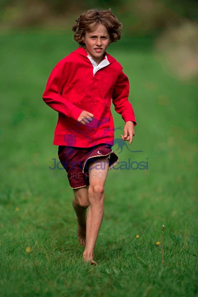 Boy Running in Grass Lane -  England - UK