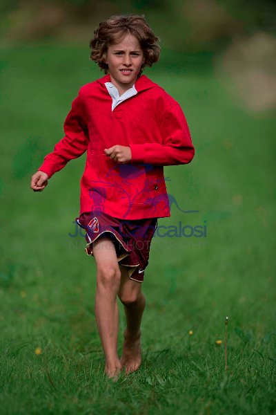 Boy Running in Grass Lane -  England - UK